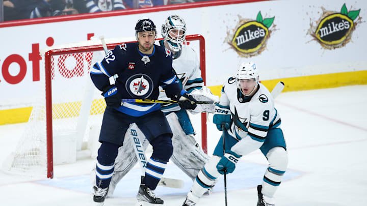 Apr 10, 2023; Winnipeg, Manitoba, CAN;  Winnipeg Jets forward Nino Niederreiter (62) and San Jose