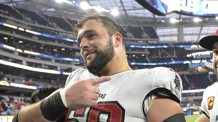 Tampa Bay Buccaneers guard Ben Bredeson and quarterback Baker Mayfield celebrate. Tampa Bay Buccaneers guard Ben Bredeson and quarterback Baker Mayfield celebrate.