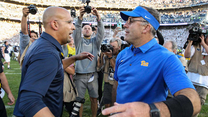 Sep 9, 2017; University Park, PA, USA; Penn State Nittany Lions head coach James Franklin (left) and Pittsburgh Panthers head coach Pat Narduzzi (right) congratulate each other at mid field following the competition of the game at Beaver Stadium. Penn State defeated Pitt 33-14. Mandatory Credit: Matthew O'Haren-Imagn Images Sep 9, 2017; University Park, PA, USA; Penn State Nittany Lions head coach James Franklin (left) and Pittsburgh Panthers head coach Pat Narduzzi (right) congratulate each other at mid field following the competition of the game at Beaver Stadium. Penn State defeated Pitt 33-14. Mandatory Credit: Matthew O'Haren-Imagn Images