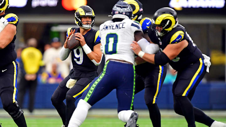 Nov 16, 2025; Inglewood, California, USA; Los Angeles Rams quarterback Matthew Stafford (9) throws a pass during the second half against the Seattle Seahawks at SoFi Stadium. Mandatory Credit: Gary A. Vasquez-Imagn Images