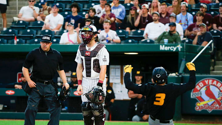 Mizzou's Danny Corona slides safely into home as the Tigers took on the Missouri State Beats at Hammons Field on Tuesday, April 16, 2024
