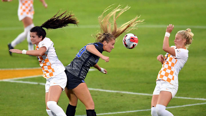 Tennessee midfielder Hannah Tillett (10) and defender Abbey Burdette (3) try to intercept the ball along with Kentucky forward Jordyn Rhodes (30) in an NCAA women's soccer match between the Tennessee Lady Vols and Kentucky Wildcats in Knoxville, Tenn. on Thursday, October 28, 2021.

Kns Lady Vols Soccer