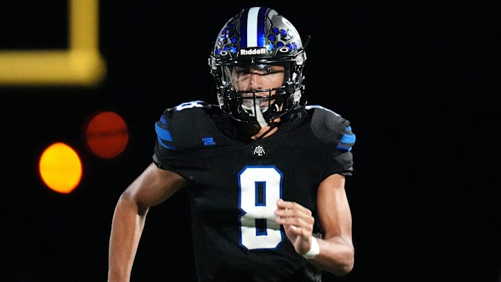 American Leadership Academy Gilbert North quarterback Adam Damante scrambles with the ball against Arizona College Prep on Friday, Oct. 21. 2022.

Ala Prep 19