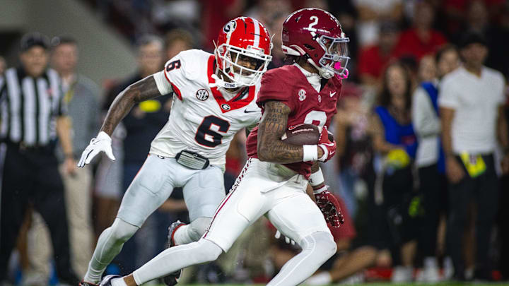 Sep 28, 2024; Tuscaloosa, Alabama, USA; Georgia Bulldogs defensive back Daylen Everette (6) pursues Alabama Crimson Tide wide receiver Ryan Williams (2) during the first quarter at Bryant-Denny Stadium. Mandatory Credit: Will McLelland-Imagn Images