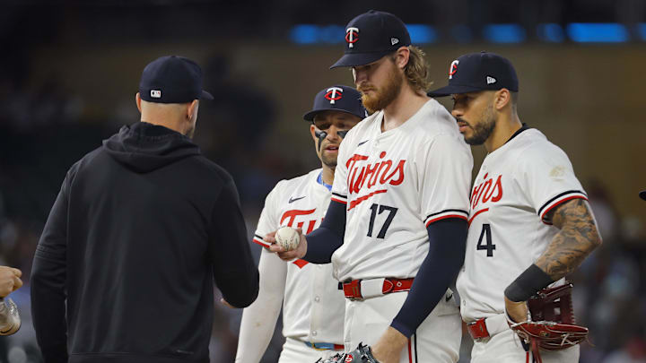 Sep 24, 2024; Minneapolis, Minnesota, USA; Minnesota Twins starting pitcher Bailey Ober (17) gives the ball to manager Rocco Baldelli after pitching to the Miami Marlins as third baseman Royce Lewis (23) and Carlos Correa (4) look on in the sixth inning at Target Field. Mandatory Credit: Bruce Kluckhohn-Imagn Images Sep 24, 2024; Minneapolis, Minnesota, USA; Minnesota Twins starting pitcher Bailey Ober (17) gives the ball to manager Rocco Baldelli after pitching to the Miami Marlins as third baseman Royce Lewis (23) and Carlos Correa (4) look on in the sixth inning at Target Field. Mandatory Credit: Bruce Kluckhohn-Imagn Images