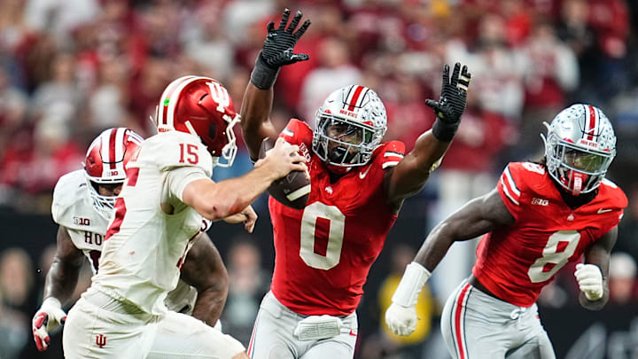 Ohio State Buckeyes linebacker Sonny Styles (0) pressures Indiana Hoosiers quarterback Fernando Mendoza (15) during the Big Ten Conference championship game at Lucas Oil Stadium in Indianapolis on Dec. 6, 2025. Ohio State lost 13-10.