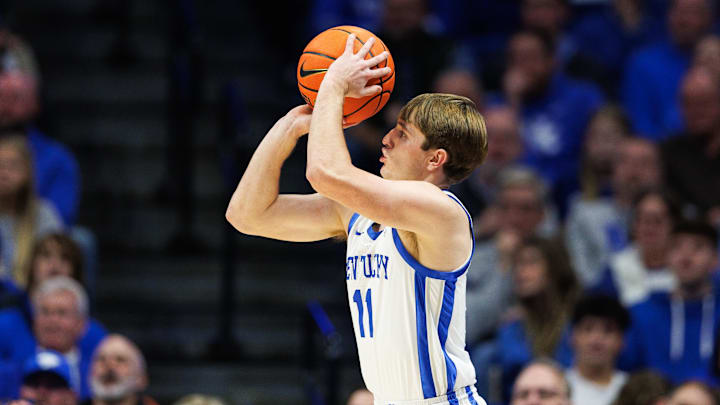 Dec 31, 2024; Lexington, Kentucky, USA; Kentucky Wildcats guard Travis Perry (11) makes a three point basket during the first half against the Brown Bears at Rupp Arena at Central Bank Center. Mandatory Credit: Jordan Prather-Imagn Images