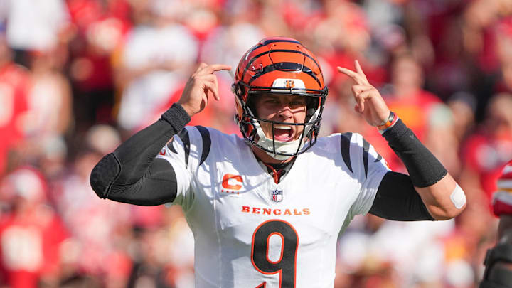 Sep 15, 2024; Kansas City, Missouri, USA; Cincinnati Bengals quarterback Joe Burrow (9) gestures on the line of scrimmage against the Kansas City Chiefs during the first half at GEHA Field at Arrowhead Stadium. Mandatory Credit: Denny Medley-Imagn Images
