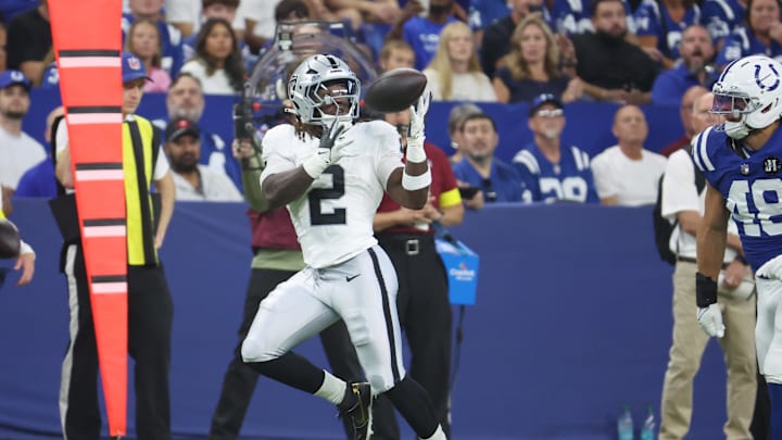 Oct 5, 2025; Indianapolis, Indiana, USA; Las Vegas Raiders running back Ashton Jeanty (2) makes a catch against the Indianapolis Colts during the first quarter at Lucas Oil Stadium. Mandatory Credit: Trevor Ruszkowski-Imagn Images