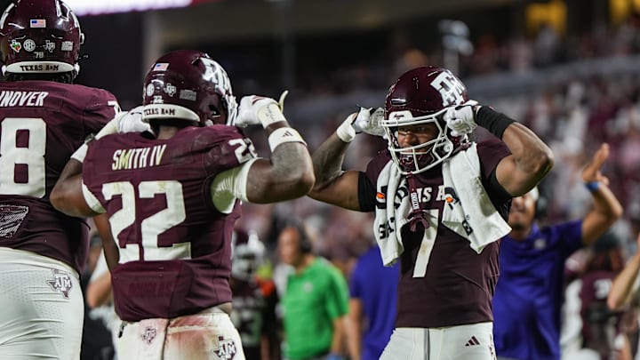 Aug 30, 2025; College Station, Texas, USA; Texas A&M Aggies running back EJ Smith (22) and Texas A&M Aggies wide receiver KC Concepcion (7) celebrate a touchdown during the second half against the UTSA Roadrunners at Kyle Field. Mandatory Credit: Sean Thomas-Imagn Images Aug 30, 2025; College Station, Texas, USA; Texas A&M Aggies running back EJ Smith (22) and Texas A&M Aggies wide receiver KC Concepcion (7) celebrate a touchdown during the second half against the UTSA Roadrunners at Kyle Field. Mandatory Credit: Sean Thomas-Imagn Images