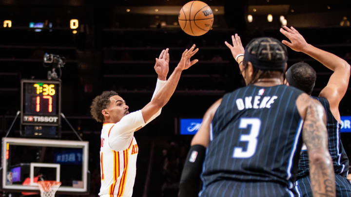 Jan 17, 2024; Atlanta, Georgia, USA; Atlanta Hawks guard Trae Young (11) shoots three point shot over Orlando Magic forward Chuma Okeke (3) during third quarter at State Farm Arena. Mandatory Credit: Jordan Godfree-USA TODAY Sports Jan 17, 2024; Atlanta, Georgia, USA; Atlanta Hawks guard Trae Young (11) shoots three point shot over Orlando Magic forward Chuma Okeke (3) during third quarter at State Farm Arena. Mandatory Credit: Jordan Godfree-USA TODAY Sports
