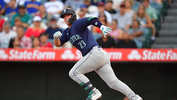 Seattle Mariners first baseman Ty France (23) runs after hitting into a fielder choice against the Los Angeles Angels during the first inning at Angel Stadium in July.