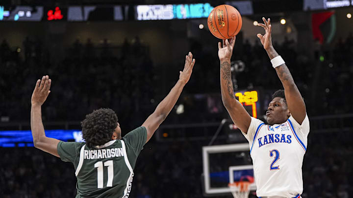 Nov 12, 2024; Atlanta, Georgia, USA; Kansas Jayhawks guard AJ Storr (2) shoots over Michigan State Spartans guard Jase Richardson (11) during the second half at State Farm Arena. Mandatory Credit: Dale Zanine-Imagn Images Nov 12, 2024; Atlanta, Georgia, USA; Kansas Jayhawks guard AJ Storr (2) shoots over Michigan State Spartans guard Jase Richardson (11) during the second half at State Farm Arena. Mandatory Credit: Dale Zanine-Imagn Images