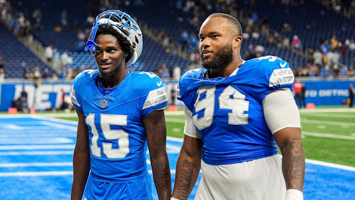 Detroit Lions cornerback Ennis Rakestraw Jr. (15), left, talks to defensive tackle Mekhi Wingo (94) was they walk off the field after 24-17 win over Pittsburgh Steelers at a preseason game at Ford Field in Detroit on Saturday, August 24, 2024.