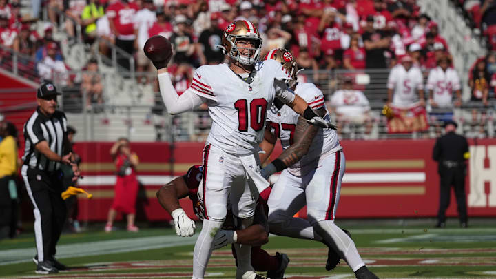 Sep 21, 2025; Santa Clara, California, USA; San Francisco 49ers quarterback Mac Jones (10) is sacked by Arizona Cardinals defensive end Calais Campbell (93) for a safety during the second half at Levi's Stadium. Mandatory Credit: Cary Edmondson-Imagn Images