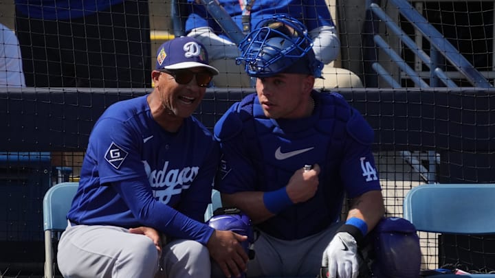 Mar 9, 2026; Phoenix, Arizona, USA; Los Angeles Dodgers manager Dave Roberts (30) and catcher Dalton Rushing (68) talk in the second inning against the Milwaukee Brewers at American Family Fields of Phoenix. Mandatory Credit: Rick Scuteri-Imagn Images Mar 9, 2026; Phoenix, Arizona, USA; Los Angeles Dodgers manager Dave Roberts (30) and catcher Dalton Rushing (68) talk in the second inning against the Milwaukee Brewers at American Family Fields of Phoenix. Mandatory Credit: Rick Scuteri-Imagn Images