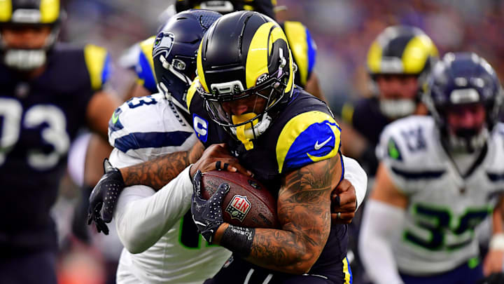 Nov 16, 2025; Inglewood, California, USA; Los Angeles Rams running back Kyren Williams (23) against Seattle Seahawks linebacker Ernest Jones IV (13) during the second half at SoFi Stadium. Mandatory Credit: Gary A. Vasquez-Imagn Images Nov 16, 2025; Inglewood, California, USA; Los Angeles Rams running back Kyren Williams (23) against Seattle Seahawks linebacker Ernest Jones IV (13) during the second half at SoFi Stadium. Mandatory Credit: Gary A. Vasquez-Imagn Images