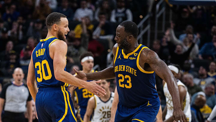 Golden State Warriors guard Stephen Curry (30) celebrates a made basket with forward Draymond Green (23) in the second half against the Indiana Pacers at Gainbridge Fieldhouse. Mandatory Credit: Trevor Ruszkowski-Imagn Images
