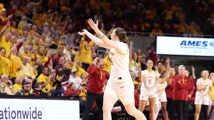 Feb 25, 2026; Ames, Iowa, USA; Iowa State Cyclones forward Addy Brown (24) celebrates with the crowd against the Oklahoma State Cowboys in the second half at James H. Hilton Coliseum. Mandatory Credit: Reese Strickland-Imagn Images
