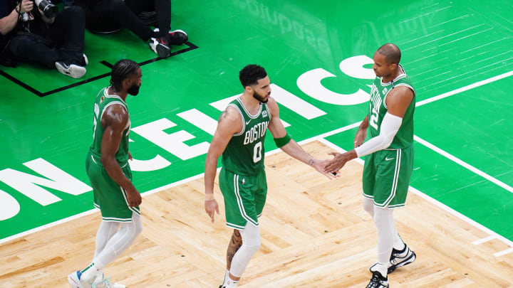 Jun 17, 2024; Boston, Massachusetts, USA; Boston Celtics forward Jayson Tatum (0) and center Al Horford (42) react in the second quarter against the Dallas Mavericks during game five of the 2024 NBA Finals at TD Garden. Mandatory Credit: David Butler II-USA TODAY Sports