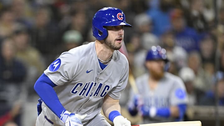 Chicago Cubs right fielder Kyle Tucker (30) hits a single during the fifth inning against the San Diego Padres at Petco Park on April 15.