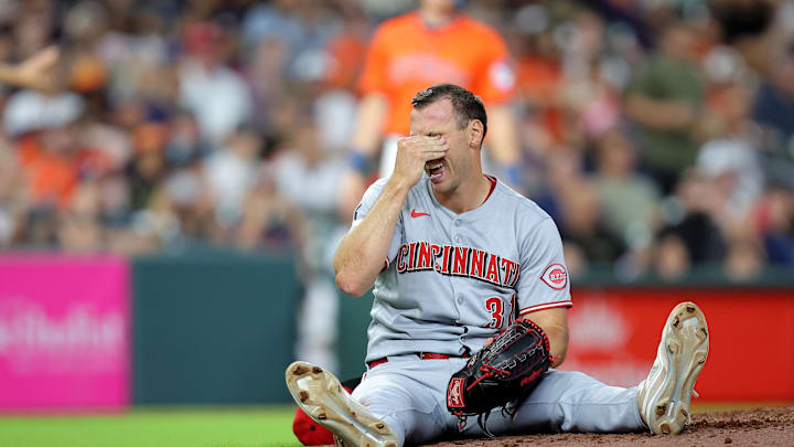 May 9, 2025; Houston, Texas, USA; Cincinnati Reds pitcher Brent Suter (31) sits on the mound after sustaining a slight injury against the Houston Astros during the eighth inning at Daikin Park. Mandatory Credit: Erik Williams-Imagn Images