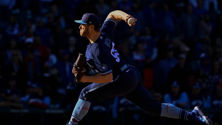 Sep 30, 2022; Chicago, Illinois, USA; IChicago Cubs relief pitcher Rowan Wick (50) delivers against the Cincinnati Reds during the ninth inning at Wrigley Field. Mandatory Credit: Matt Marton-USA TODAY Sports Sep 30, 2022; Chicago, Illinois, USA; IChicago Cubs relief pitcher Rowan Wick (50) delivers against the Cincinnati Reds during the ninth inning at Wrigley Field. Mandatory Credit: Matt Marton-USA TODAY Sports