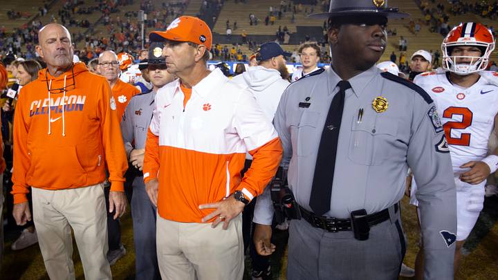 Sep 25, 2026; Berkeley, California, USA; Clemson Tigers head coach Dabo Swinney (center) waits to shake hands with California Golden Bears head coach Tosh Lupoi following their game at California Memorial Stadium. Mandatory Credit: D. Ross Cameron-Imagn Images Sep 25, 2026; Berkeley, California, USA; Clemson Tigers head coach Dabo Swinney (center) waits to shake hands with California Golden Bears head coach Tosh Lupoi following their game at California Memorial Stadium. Mandatory Credit: D. Ross Cameron-Imagn Images