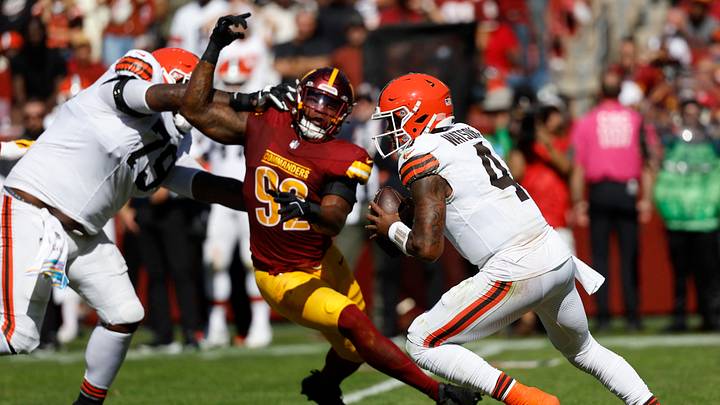 Oct 6, 2024; Landover, Maryland, USA; Cleveland Browns quarterback Deshaun Watson (4) scrambles from Washington Commanders defensive end Dorance Armstrong (92) during the second quarter at NorthWest Stadium. Mandatory Credit: Geoff Burke-Imagn Images Oct 6, 2024; Landover, Maryland, USA; Cleveland Browns quarterback Deshaun Watson (4) scrambles from Washington Commanders defensive end Dorance Armstrong (92) during the second quarter at NorthWest Stadium. Mandatory Credit: Geoff Burke-Imagn Images