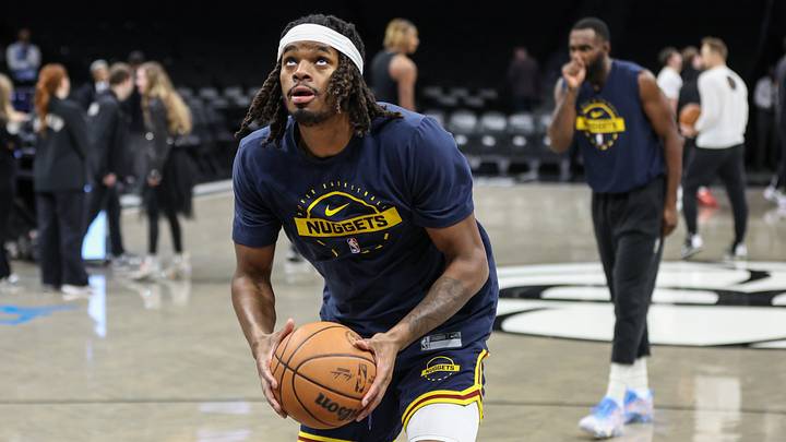 Jan 4, 2026; Brooklyn, New York, USA; Denver Nuggets forward Daron Holmes II (14) warms up prior to the game against the Brooklyn Nets at Barclays Center. Mandatory Credit: Wendell Cruz-Imagn Images Jan 4, 2026; Brooklyn, New York, USA; Denver Nuggets forward Daron Holmes II (14) warms up prior to the game against the Brooklyn Nets at Barclays Center. Mandatory Credit: Wendell Cruz-Imagn Images