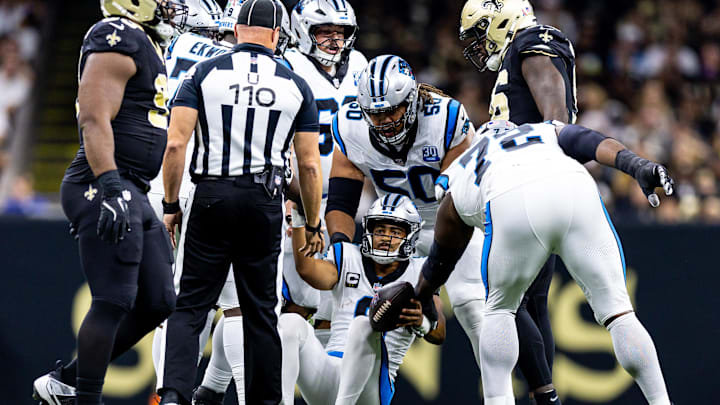 Sep 8, 2024; New Orleans, Louisiana, USA; Carolina Panthers quarterback Bryce Young (9) helped off the turf after a sack against the New Orleans Saints during the first half at Caesars Superdome. Mandatory Credit: Stephen Lew-Imagn Images Sep 8, 2024; New Orleans, Louisiana, USA; Carolina Panthers quarterback Bryce Young (9) helped off the turf after a sack against the New Orleans Saints during the first half at Caesars Superdome. Mandatory Credit: Stephen Lew-Imagn Images