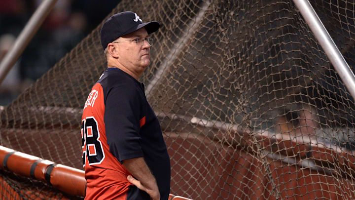 Atlanta Braves hitting coach Kevin Seitzer (28) watches batting practice before the game against the Arizona Diamondbacks at Chase Field in 2018.
