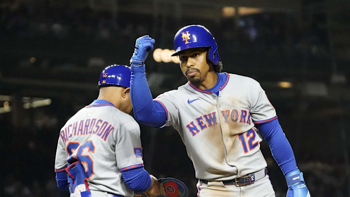 Sep 23, 2025; Chicago, Illinois, USA; New York Mets shortstop Francisco Lindor (12) reacts after hitting a one run single against the Chicago Cubs during the sixth inning at Wrigley Field. Mandatory Credit: David Banks-Imagn Images