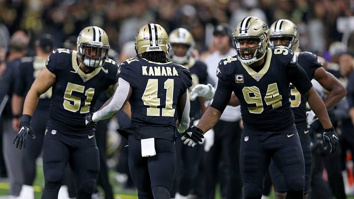 Dec 3, 2017; New Orleans, LA, USA; New Orleans Saints running back Alvin Kamara (41) is congratulated by linebacker Manti Te'o (51) and defensive end Cameron Jordan (94) after a third quarter touchdown against the Carolina Panthers in at the Mercedes-Benz Superdome. Mandatory Credit: Chuck Cook-USA TODAY Sports Dec 3, 2017; New Orleans, LA, USA; New Orleans Saints running back Alvin Kamara (41) is congratulated by linebacker Manti Te'o (51) and defensive end Cameron Jordan (94) after a third quarter touchdown against the Carolina Panthers in at the Mercedes-Benz Superdome. Mandatory Credit: Chuck Cook-USA TODAY Sports