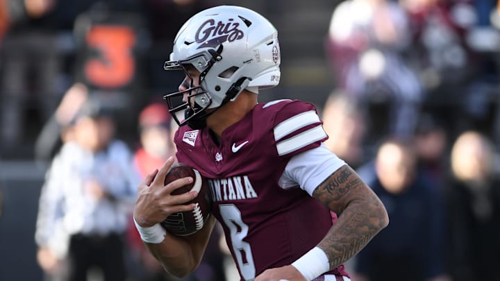 Montana Grizzlies quarterback Keali'I Ah Yat (8) carries the ball against the Montana State Bobcats