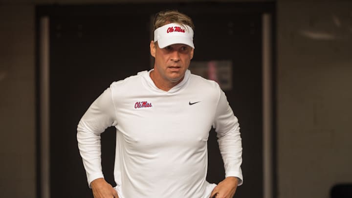 Oct 12, 2024; Baton Rouge, Louisiana, USA; Mississippi Rebels head coach Lane Kiffin takes the field before a game against the LSU Tigers at Tiger Stadium. Mandatory Credit: Stephen Lew-Imagn Images