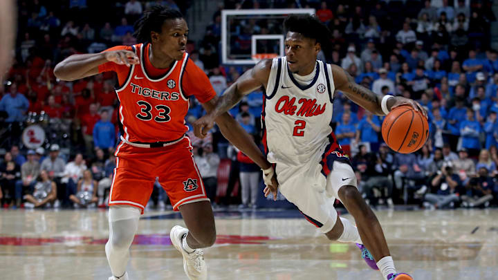 Jan 20, 2026; Oxford, Mississippi, USA; Mississippi Rebels guard AJ Storr (2) drives to the basket as Auburn Tigers forward Sebastian Williams-Adams (33) defends during the second half at The Sandy and John Black Pavilion at Ole Miss. Mandatory Credit: Petre Thomas-Imagn Images Jan 20, 2026; Oxford, Mississippi, USA; Mississippi Rebels guard AJ Storr (2) drives to the basket as Auburn Tigers forward Sebastian Williams-Adams (33) defends during the second half at The Sandy and John Black Pavilion at Ole Miss. Mandatory Credit: Petre Thomas-Imagn Images