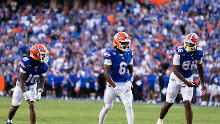 Sep 14, 2024; Gainesville, Florida, USA; Florida Gators wide receiver Tank Hawkins (10), Florida Gators wide receiver Elijhah Badger (6) and Florida Gators tight end Tony Livingston (86) stand at the line of scrimmage against the Texas A&M Aggies during the first half at Ben Hill Griffin Stadium. Mandatory Credit: Matt Pendleton-Imagn Images