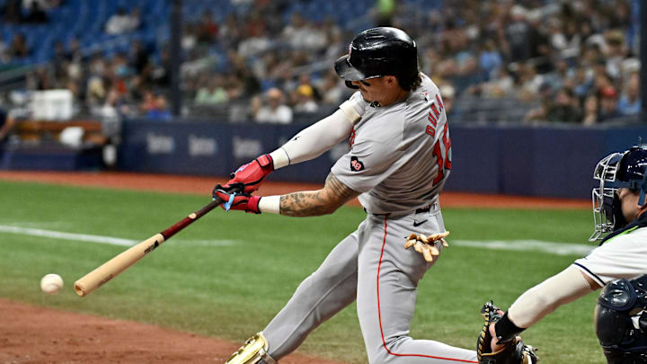 Boston Red Sox center fielder Jarren Duran (16) hits a RBI single in the eighth inning against the Tampa Bay Rays at Tropicana Field on Sept 18.