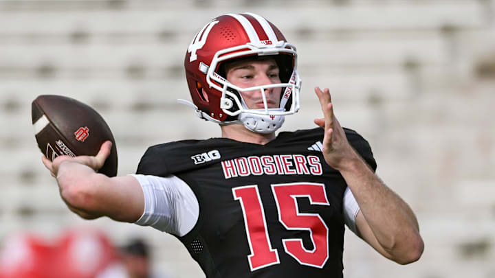 Indiana’s Fernando Mendoza (15) throws a pass during spring practice at Memorial Stadium on Thursday, April 3, 2025. Indiana’s Fernando Mendoza (15) throws a pass during spring practice at Memorial Stadium on Thursday, April 3, 2025.