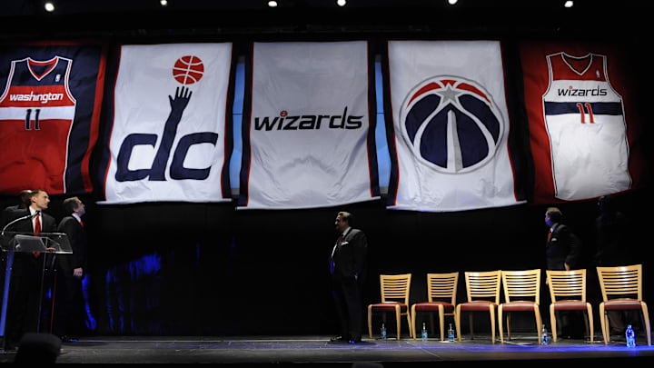 May 10, 2011; Washington, DC, USA; Banners with the new Washington Wizards colors and logos are unfurled during the unveiling of the new uniforms and logos at the Verizon Center.  Mandatory Credit: Rafael Suanes-Imagn Images