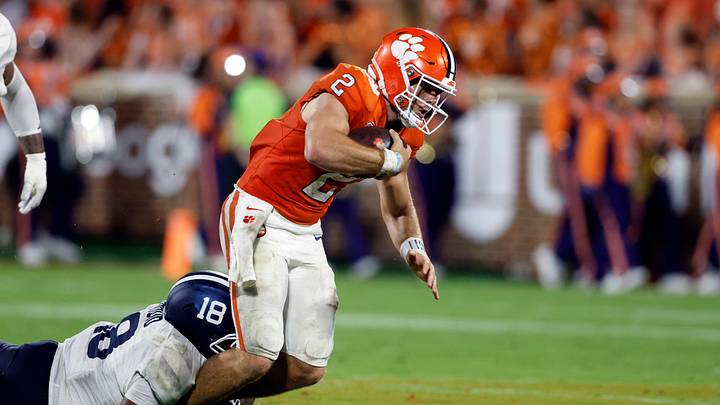 Sep 12, 2026; Clemson, South Carolina, USA; Clemson Tigers quarterback Tait Reynolds (2) is tackled by Georgia Southern Eagles defensive lineman Mj Stroud (18) during the first half at Memorial Stadium. Mandatory Credit: Butch Dill-Imagn Images Sep 12, 2026; Clemson, South Carolina, USA; Clemson Tigers quarterback Tait Reynolds (2) is tackled by Georgia Southern Eagles defensive lineman Mj Stroud (18) during the first half at Memorial Stadium. Mandatory Credit: Butch Dill-Imagn Images