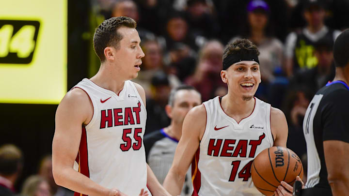 Dec 31, 2022; Salt Lake City, Utah, USA; Miami Heat forward Duncan Robinson (55) and guard Tyler