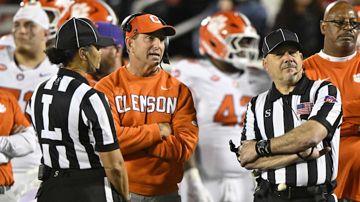 Nov 14, 2025; Louisville, Kentucky, USA; Clemson Tigers head coach Dabo Swinney talks with the officials during the first half against the Louisville Cardinals at L&N Federal Credit Union Stadium. Mandatory Credit: Jamie Rhodes-Imagn Images Nov 14, 2025; Louisville, Kentucky, USA; Clemson Tigers head coach Dabo Swinney talks with the officials during the first half against the Louisville Cardinals at L&N Federal Credit Union Stadium. Mandatory Credit: Jamie Rhodes-Imagn Images