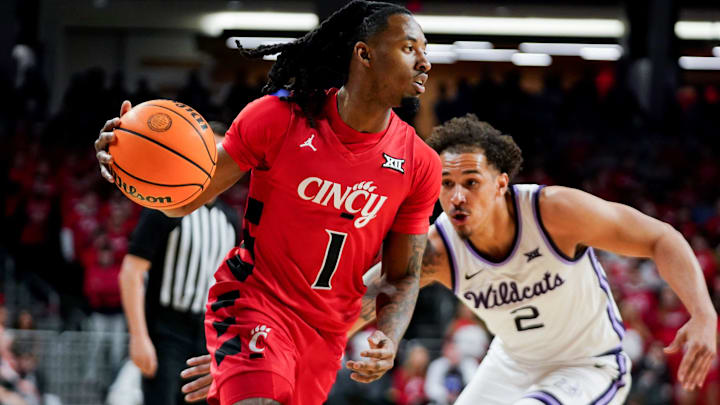 Cincinnati Bearcats guard Day Day Thomas (1) attempts to dribble the ball up to the basket in the first half of a NCAA men’s basketball game between the Cincinnati Bearcats and Kansas State Wildcats, Wednesday, March 5, 2025, at Fifth Third Arena in Cincinnati.