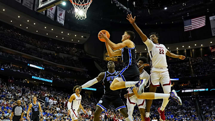 Mar 27, 2025; Newark, NJ, USA; Brigham Young Cougars guard Egor Demin (3) shoots the ball against Alabama Crimson Tide forward Aiden Sherrell (22) during the second half during an East Regional semifinal of the 2025 NCAA tournament at Prudential Center. Mandatory Credit: Robert Deutsch-Imagn Images