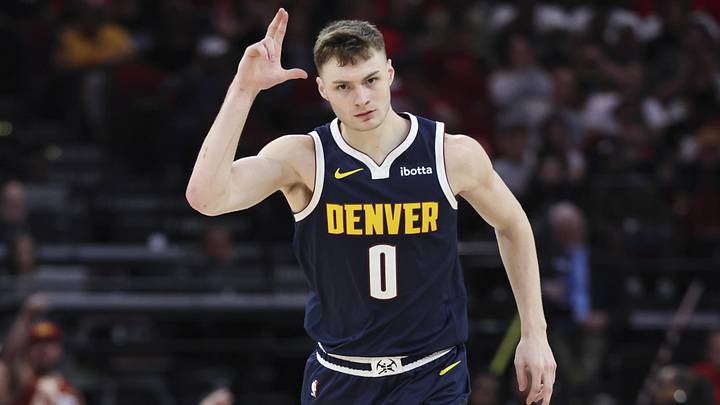Mar 23, 2025; Houston, Texas, USA; Denver Nuggets guard Christian Braun (0) reacts after making a basket during the second quarter against the Houston Rockets at Toyota Center. Mar 23, 2025; Houston, Texas, USA; Denver Nuggets guard Christian Braun (0) reacts after making a basket during the second quarter against the Houston Rockets at Toyota Center.