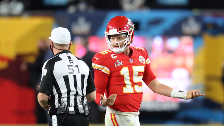 Feb 4, 2020; Tampa, FL, USA;  Kansas City Chiefs quarterback Patrick Mahomes (15) with NFL referee Carl Cheffers against the Tampa Bay Buccaneers in Super Bowl LV at Raymond James Stadium.  Mandatory Credit: Mark J. Rebilas-Imagn Images