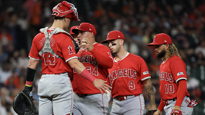 Sep 19, 2024; Houston, Texas, USA;  Los Angeles Angels catcher Logan O'Hoppe (14) talks to starting pitcher Jose Suarez (54) on the mound while playing against the Houston Astros in the second inning at Minute Maid Park. Mandatory Credit: Thomas Shea-Imagn Images