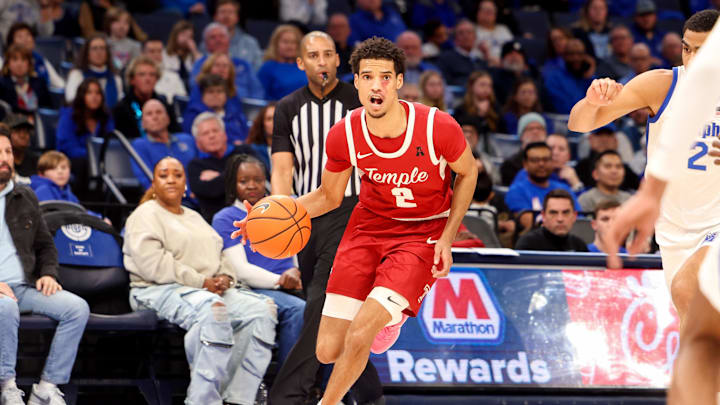 Feb 9, 2025; Memphis, Tennessee, USA; Temple Owls forward Steve Settle III (2) drives to the basket against the Memphis Tigers during the second half at FedExForum. Mandatory Credit: Wesley Hale-Imagn Images Feb 9, 2025; Memphis, Tennessee, USA; Temple Owls forward Steve Settle III (2) drives to the basket against the Memphis Tigers during the second half at FedExForum. Mandatory Credit: Wesley Hale-Imagn Images